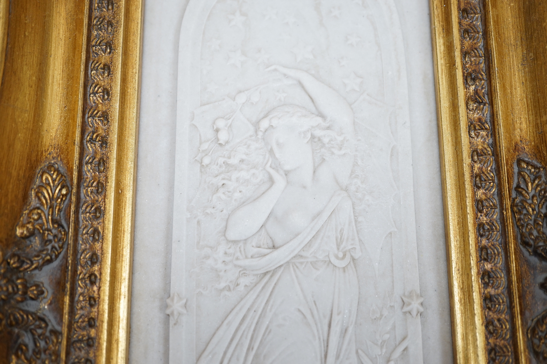 An ornate framed reconstituted stone frieze, 42 x 23cm